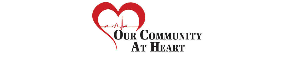 Banner of a heart with life line going through it. Picture says: Our Community At Heart.