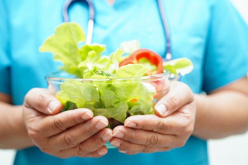 Man holding a bowl of salad
Calendar Page 2