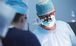 Male Surgeon in operation attire in an Operation Room.