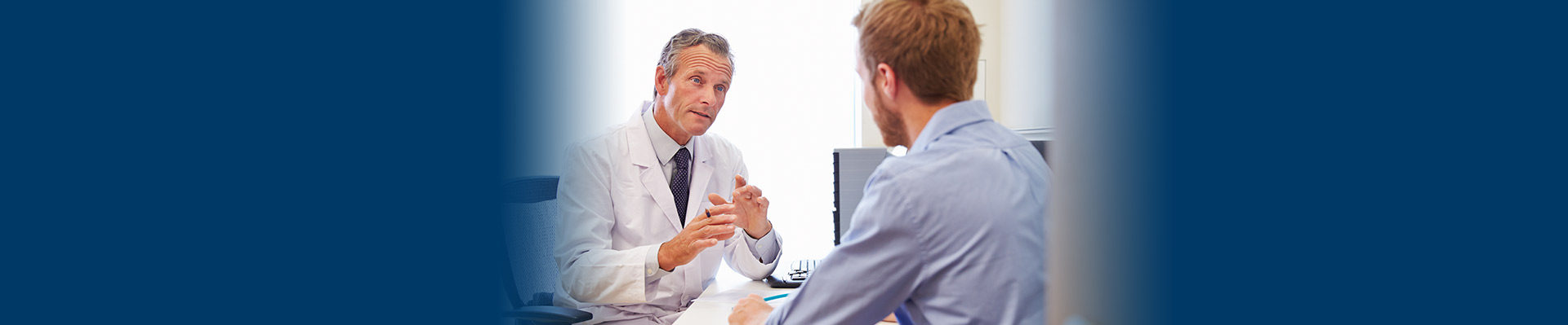 a doctor talking to a patient