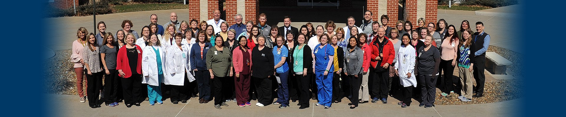 Banner picture of Washington County Hospital and Clinics Hospital Staff standing outside smiling.