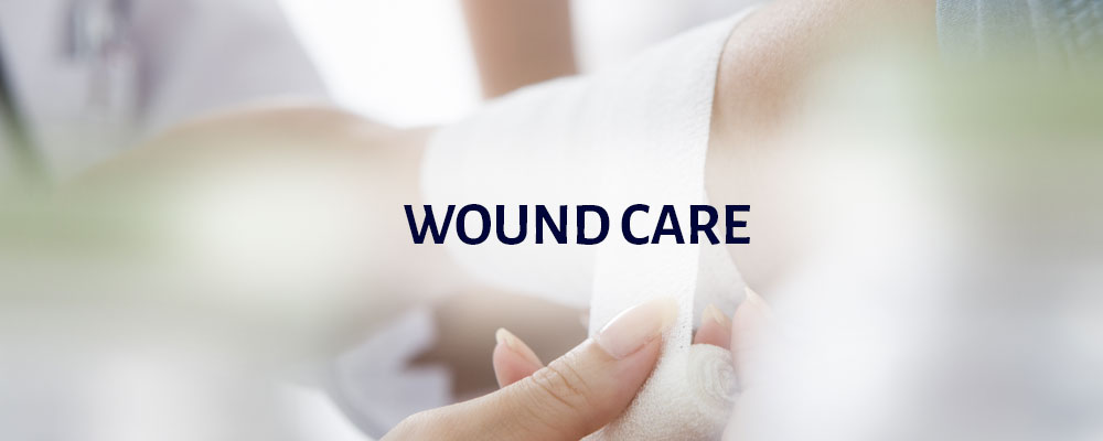 Banner picture of a wrist that is being bandaged up. Banner says: Wound Care