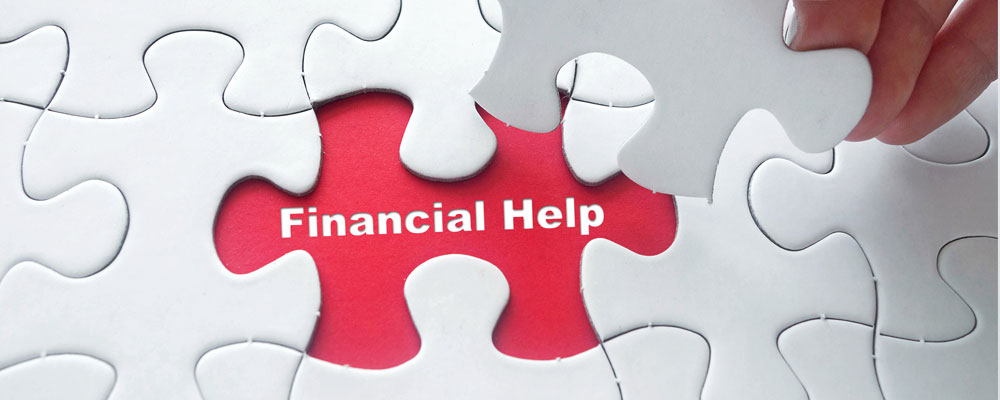 Banner picture of a puzzle with a puzzle piece missing that says "Financial Help"