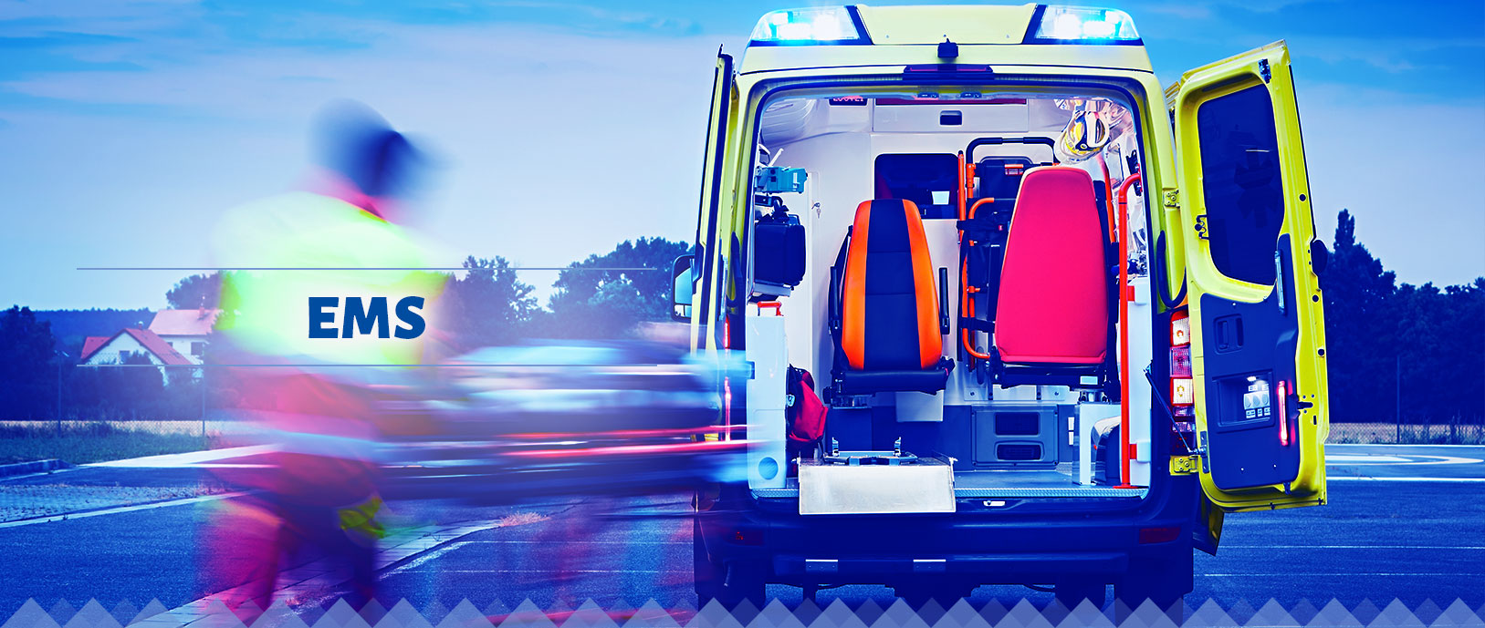 Emergency Medical Services (EMS): the back view of an emergency van with its back doors open. The van is fully geared with equipment and a bed. There is a blurred image of an emergency medical technician heading toward the van and indicating immediate response.