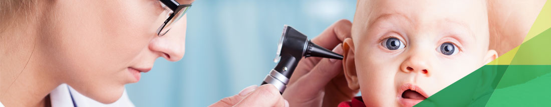 Pediatric Care: Picture of a nurse using an otoscope to check a babies ear.