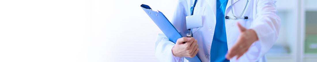 Banner picture of a Physician holding their hand out to shake hands. The Physician is wearing scrubs, a medical coat, a bage, and stethoscope around their neck. They are holding a clipboard.