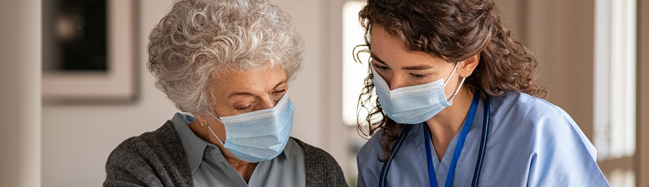 Banner Picture of a female Nurse and elderly female Patient. They are both wearing mask looking down.
-Geriatric Behavioral Health