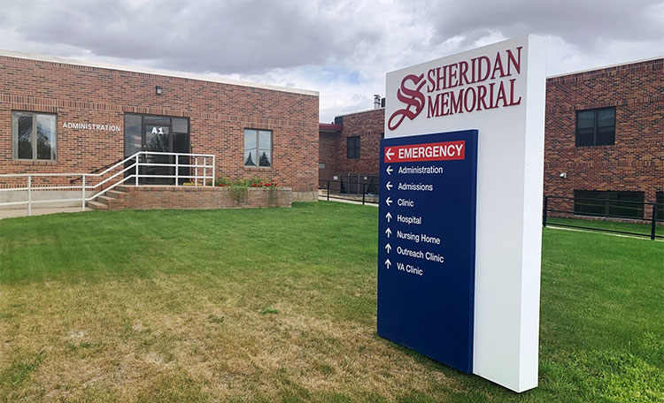 Banner picture of the Hospital sign. It says:

SHERIDAN MEMORIAL HOSPITAL
Outpatient Center ->
Watt Dialysis Center ->
EMERGENCY |
Hospital Pharmacy West ->
