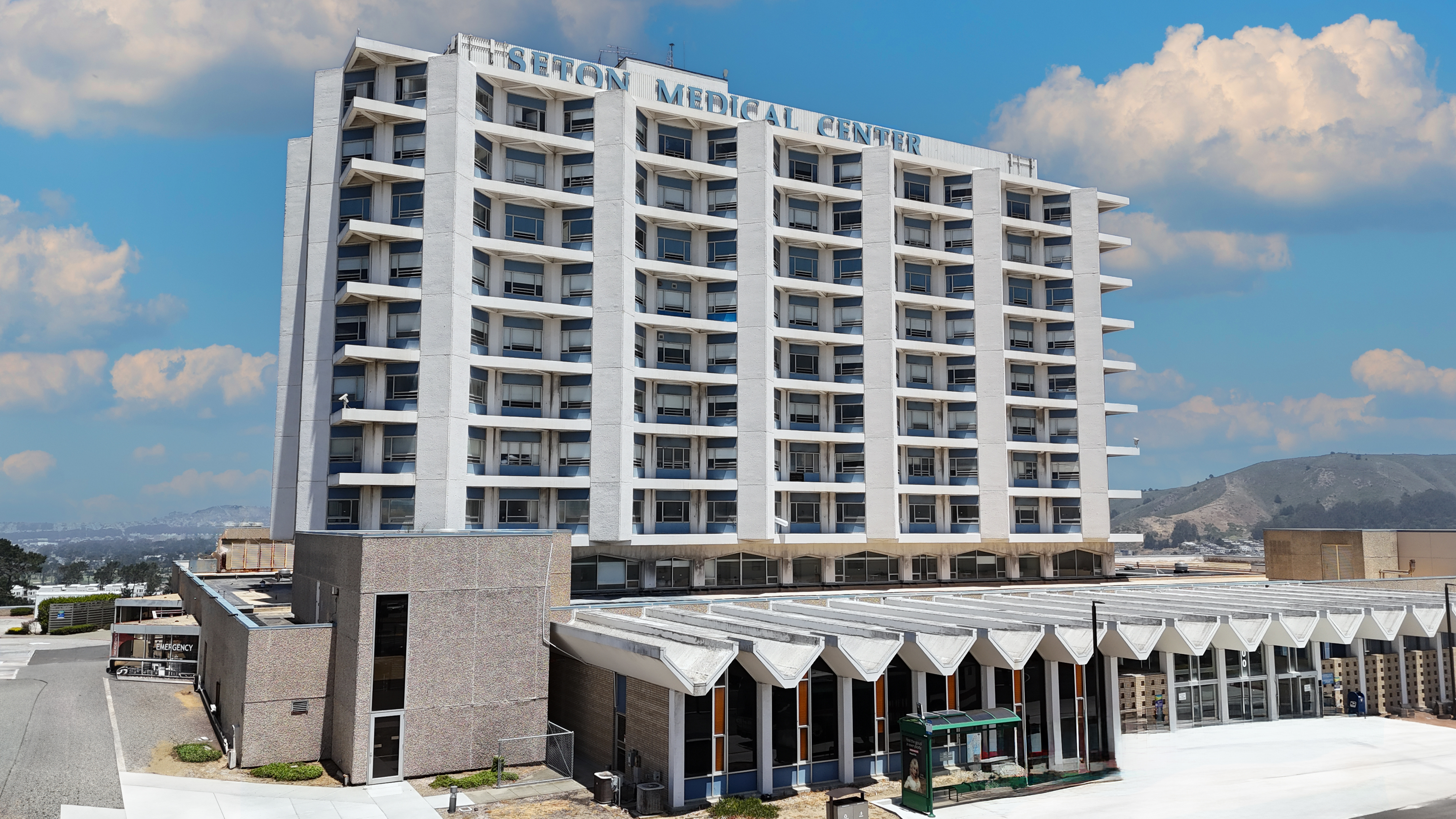 Seton Medical Center (outside shot) in a cross shaped frame.