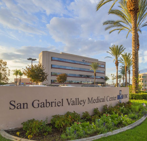 Picture of the Hospital and main entrance sign with palm trees around the front entrance. The sign says:

San Gabriel Valley Medical Center