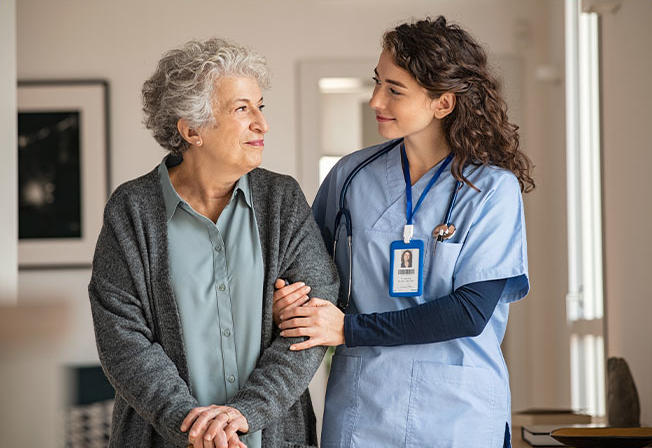 A Female Nurse and an elderly female patient speak to one another

Clinic Section
