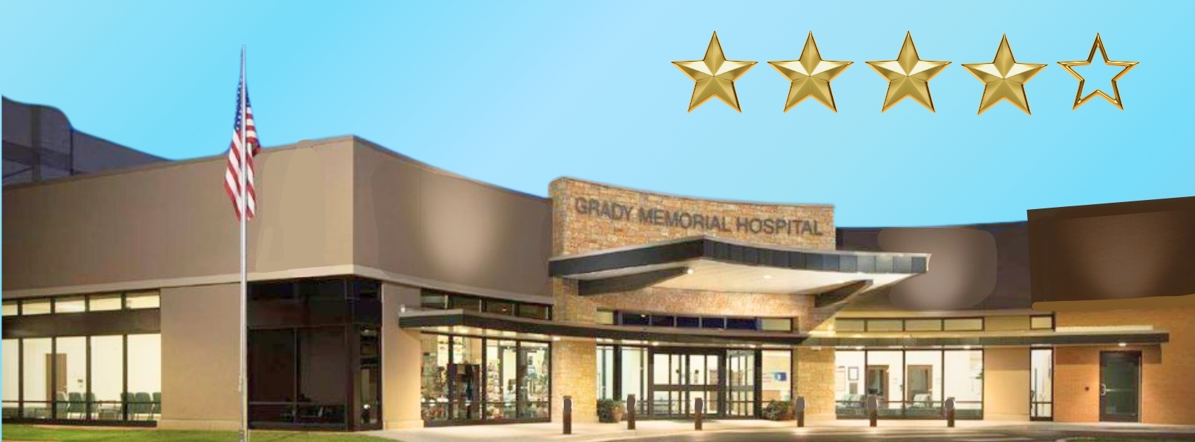 Daytime picture of front of Grady Memorial Hospital in Chickasha with 4-Star rating displayed