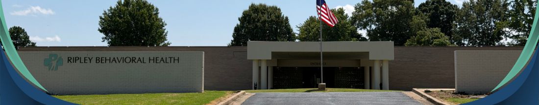front of the facility with logo
